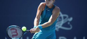 SAN JOSE, CA - AUGUST 01: Ashley Kratzer of the United States returns a shot to Elise Mertens of Belgium during Day 3 of the Mubadala Silicon Valley Classic at Spartan Tennis Complex on August 1, 2018 in San Jose, California.