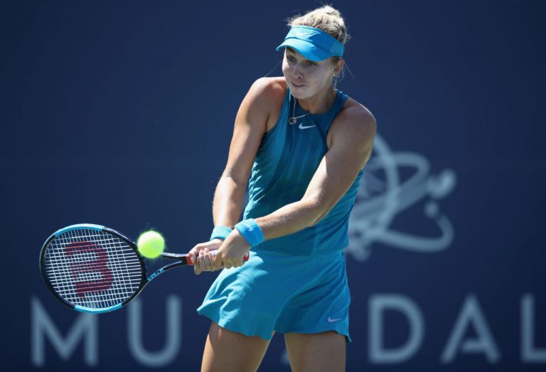 SAN JOSE, CA - AUGUST 01: Ashley Kratzer of the United States returns a shot to Elise Mertens of Belgium during Day 3 of the Mubadala Silicon Valley Classic at Spartan Tennis Complex on August 1, 2018 in San Jose, California.