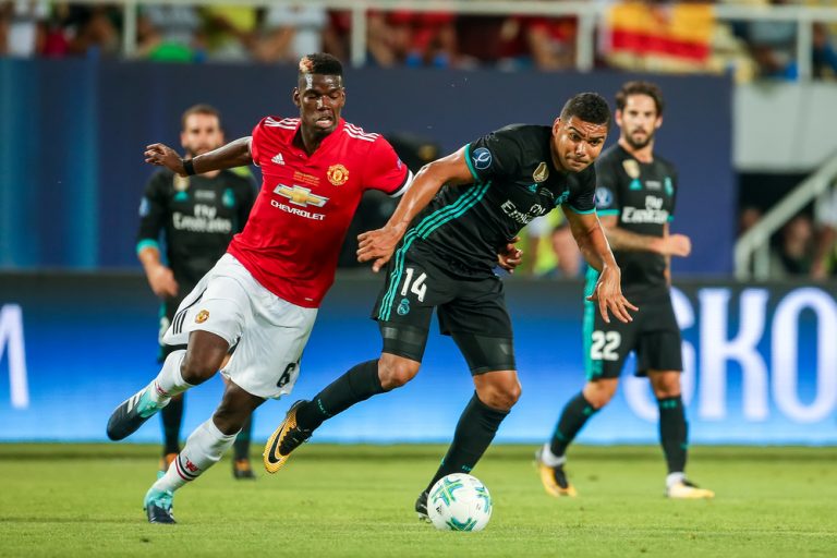 Skopje, FYROM - August 8,2017:Real Madrid Casemiro (R) and Manchester United Paul Pogba (L) during the UEFA Super Cup Final match between Real Madrid and Manchester United at Philip II Arena in Skopje