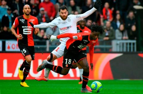 Rennes French midfielder Eduardo Camavinga (R) vies with Montpelliers French midfielder Teji Savanier (C) during the French L1 football match between Stade Rennais Football Club and Montpellier Herault SC at the Roazhon Park, in Rennes, northwestern France, on March 8, 2020.